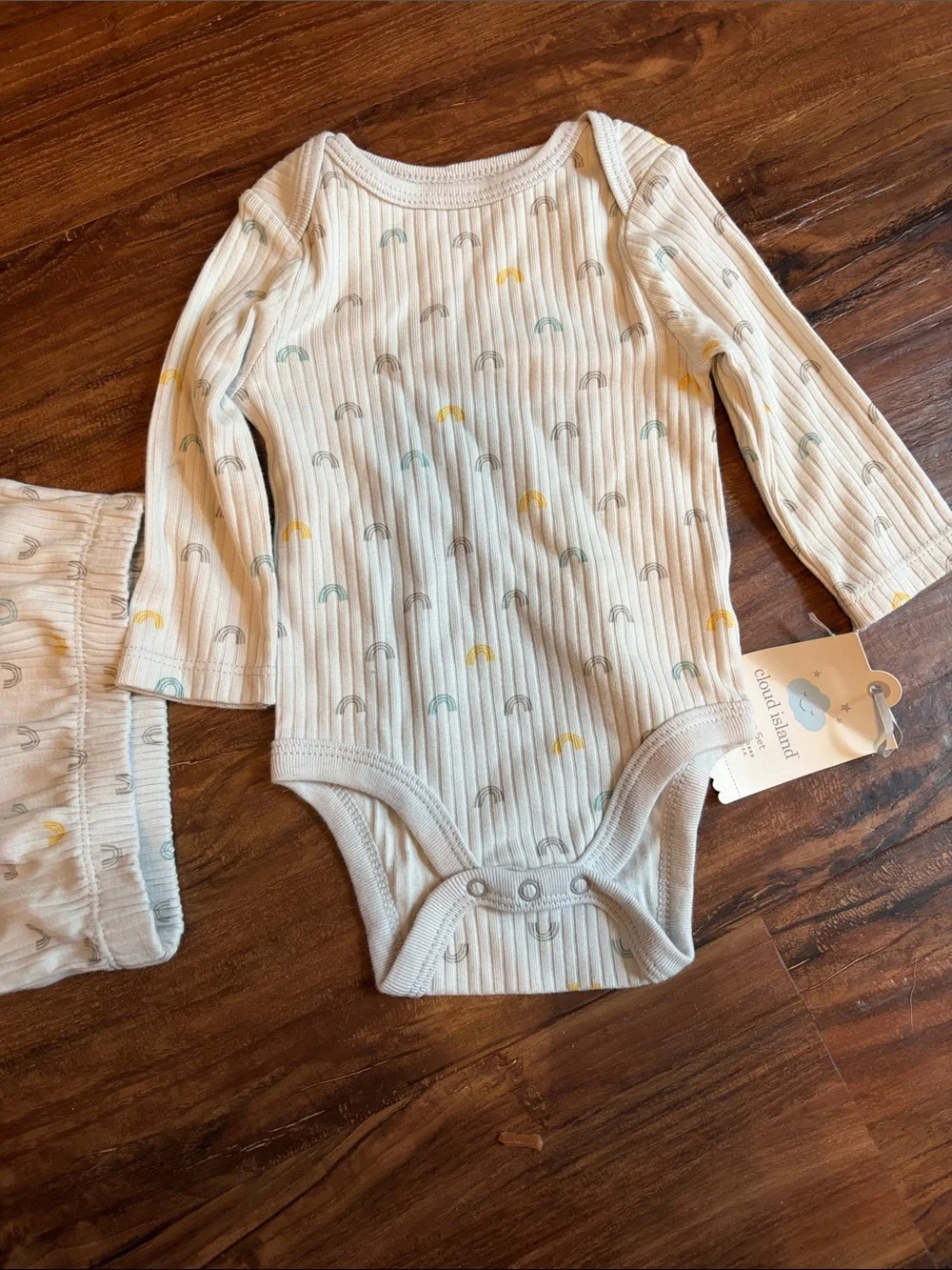 Target Ivory Ribbed Kids Pajama Set with Yellow and Light Blue Rainbows